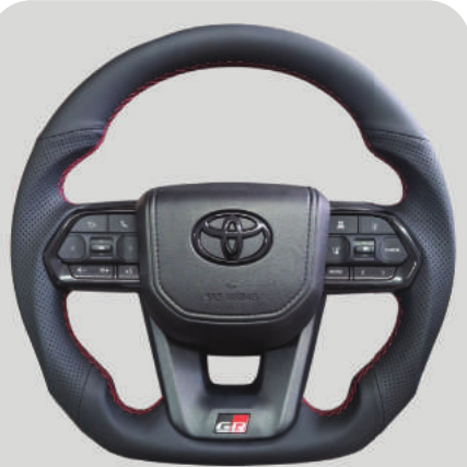 TT AUDIO LC300 STEERING WHEEL - BLACK LEATHER RED STITCHING