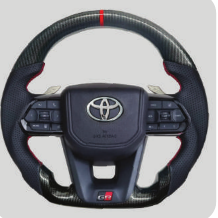 TT AUDIO LC300 STEERING WHEEL - CARBON WITH SHIFT PADDLES